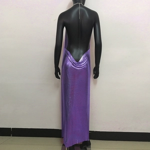 Close-up of purple metallic sequin dress featuring a deep U-shaped cowl back and chain straps