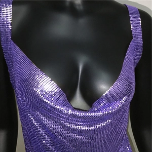Close-up of purple sequin metal mesh dress with deep V-neck and wide straps on mannequin