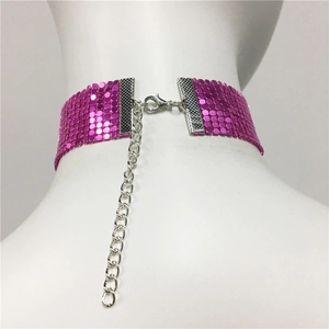 Detail of pink metal mesh choker showing lobster clasp and adjustable extender chain