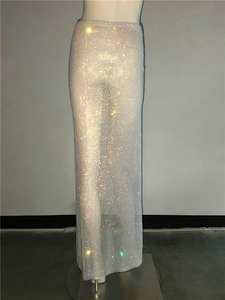 Detail of high waist white mesh maxi skirt featuring sparkling colorful rhinestones