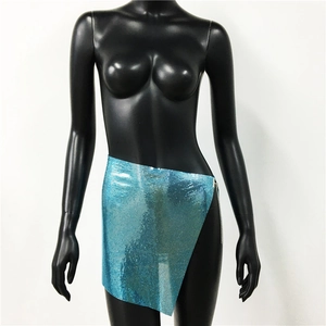 Detail of bright blue metal mesh mini skirt with asymmetric hem and chain links