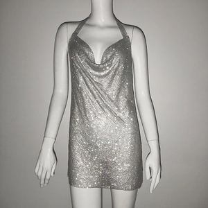 Detailed view of silver sequin mini dress featuring a cowl neck and shimmering rhinestones