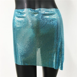 Detailed macro view of bright blue metallic sequin mesh fabric for party mini skirts