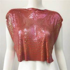 Detailed close-up of rose gold metallic sequin chainmail crop top for party wear