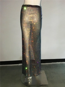 Detailed view of luxury black mesh long skirt featuring sparkling colorful rhinestones