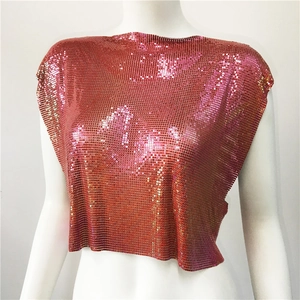 Detailed view of pink gradient metallic chainmail crop top with sequin mesh texture