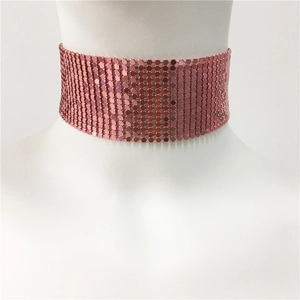 Macro view of rose gold metal mesh choker featuring hexagonal sequins on neck mannequin