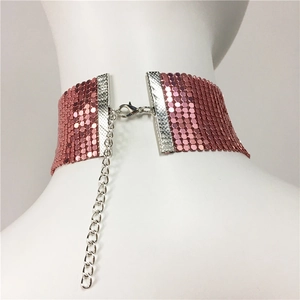 Close-up of rose pink metal sequin choker with silver lobster clasp and extender chain