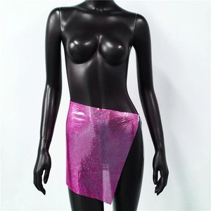 Detailed close-up of pink metallic sequin mini skirt with shimmering mesh texture