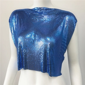 Macro shot of electric blue metallic sequin mesh top with detailed chainmail link texture