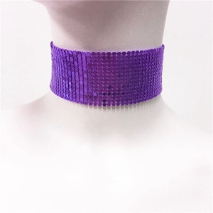 Macro detail of purple sequin mesh choker scarf with reflective metallic finish and Y2K style