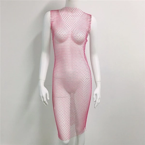 Close-up of bright rose pink fishnet dress featuring sparkling rhinestone embellishments
