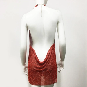 Detailed back view of red sequin halter dress featuring a deep open back and shimmer finish