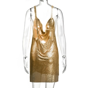 Detail view of gold metal sequin mesh dress with thin straps and glossy texture