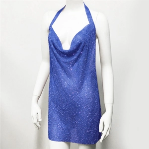 Detail of navy blue halter dress featuring shimmering rhinestones and metal mesh fabric