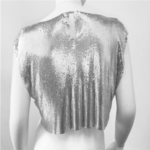 Detailed back view of silver metal mesh crop top with hollow teardrop opening design