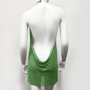 Detailed back view of green sequin halter dress with open back and draped cowl design