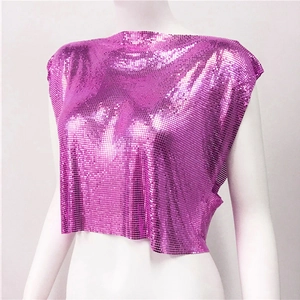 Close-up of shiny purple metal sequin crop top with chainmail texture for party festivals
