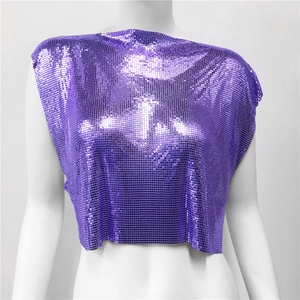 Close-up of purple metallic sequin mesh top with reflective scale texture for festivals