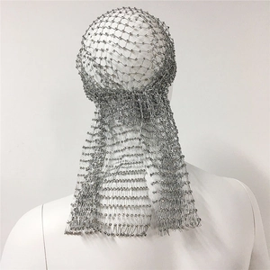 Close-up of sparkling silver rhinestone mesh headpiece with long tassels for women
