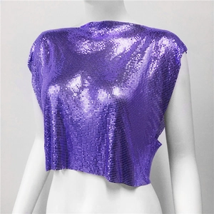 Macro detail of purple metallic sequin fabric with liquid texture on a crop top