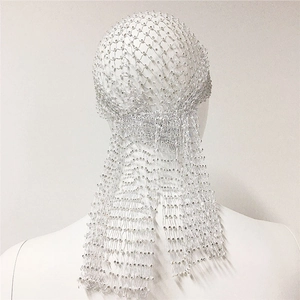 Detailed macro view of the sparkling rhinestone mesh weave on this luxury silver headscarf