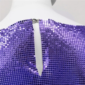 Detail of purple metallic sequin top showing the lobster clasp closure and woven mesh texture