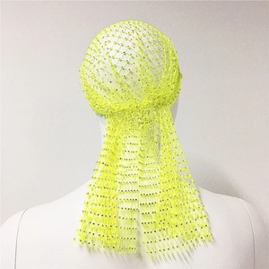 Detail of neon yellow mesh durag with sparkling rhinestones and long tail feature