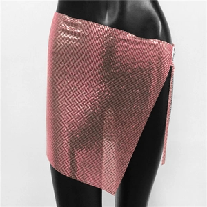 Detailed view of pink metallic sequin mesh skirt with irregular chain hem on a mannequin