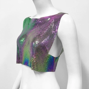 Close-up of holographic metal mesh sequins on a sexy backless party crop top vest