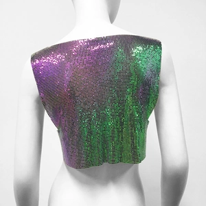 Macro detail of purple-green gradient sequin metallic mesh cropped tank top vest