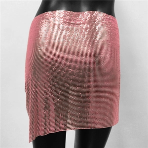 Detail of pink metal sequins mesh skirt with asymmetric hem for party wear