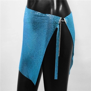 Macro shot of electric blue metal mesh sequin skirt with silver buckle on black mannequin