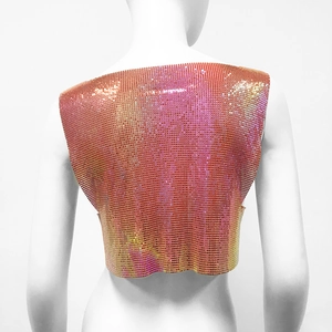 Detailed back view of gradient pink and orange sequin metallic mesh crop top