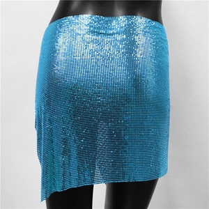 Detailed view of the bright blue metallic sequin mesh and asymmetrical hemline design