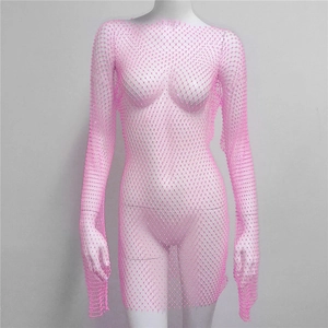 Detailed view of pink fishnet dress with sparkling rhinestones and sheer mesh fabric
