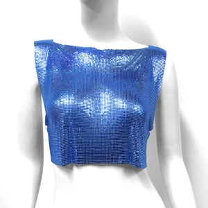 Detail of bright blue sequin crop top with metallic texture for party and club wear