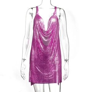 Detail of pink metal sequin mesh fabric on a sexy deep V-neck party mini dress