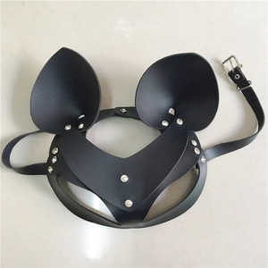 Detail view of black holographic leather mask with mouse ear design and white rhinestones