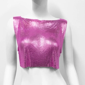 Detail shot of the metallic rose pink sequins and mesh fabric on this punk style crop top