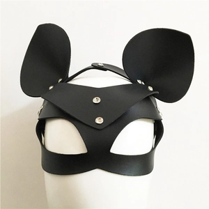 Detail of black leather masquerade mask with round ears and silver metal rivets