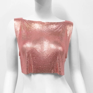 Detailed view of rose gold metallic sequin crop top with shimmering chainmail texture
