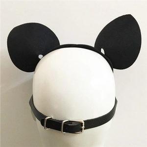 Detail view of black cat ear headpiece with adjustable metal buckle on a white mannequin