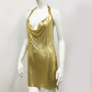 Detail of gold metal mesh sequins and draped halter neck on a sexy party mini dress