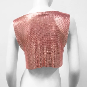 Detailed back view of rose gold metallic sequin crop top with chainmail texture