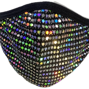 Vue macro d'un masque de mode noir avec des paillettes holographiques et scintillantes