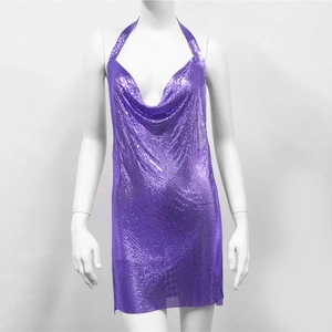 Close-up of purple metallic chainmail fabric and draped halter neckline on a mini dress