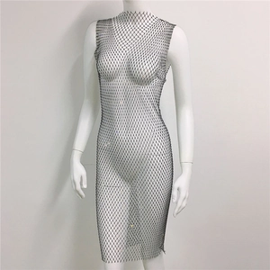 Detail of black mesh fishnet dress featuring sparkling rhinestones on sleeveless body