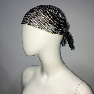 Detail of black mesh headscarf with sparkling rhinestones and tie-back closure