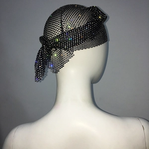 Detail of black mesh headscarf featuring sparkling rhinestones for party fashion